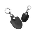 Black carbon fiber and leather AirTag keychain holder, front and back views